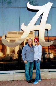 Billy and Celeste Goodwin standing in front of a script A